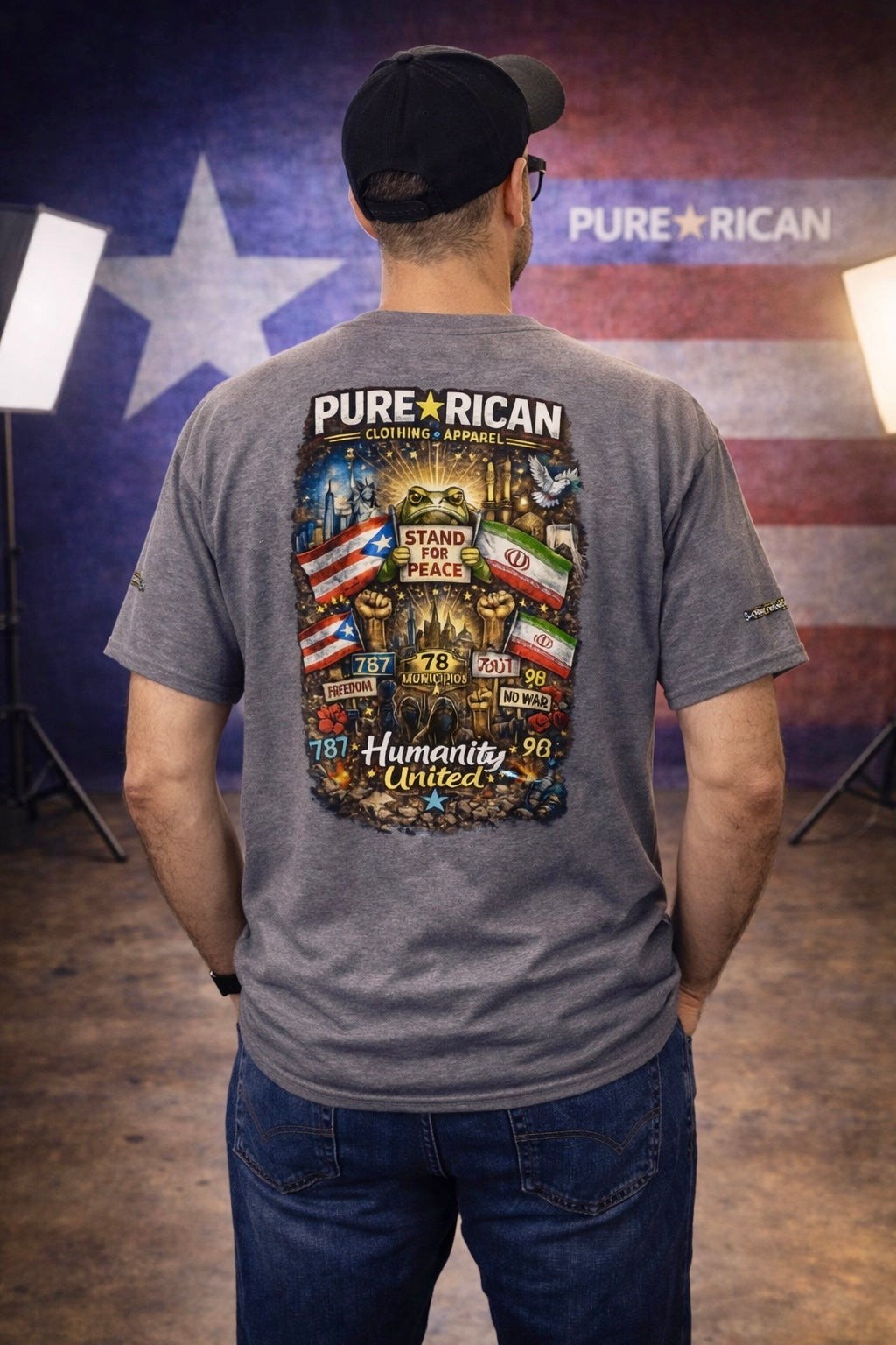 Model wearing Pure⭐️Rican Stand For Peace Humanity United Puerto Rican cultural t-shirt in studio with Puerto Rican flag background