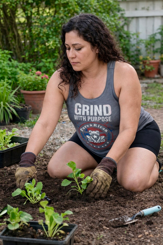 Puro Boricua Grind With Purpose women’s racerback tank front view with statement graphic