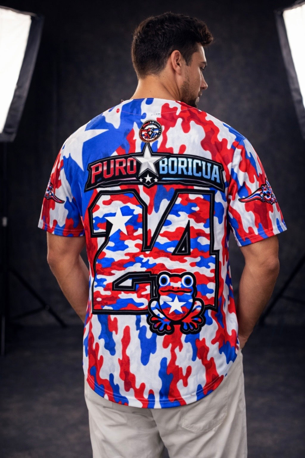 Back view of Pure⭐️Rican Puro Boricua 24 baseball jersey featuring oversized 24 number, Sapo Concho frog mascot, and Puerto Rican camo pattern.