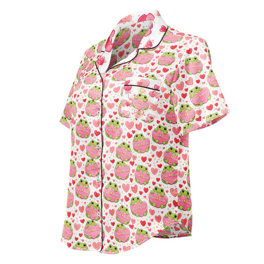 Angled view of the Pure⭐️Rican Valentine Frog satin pajama shirt in white satin with frog holding candy heart design
