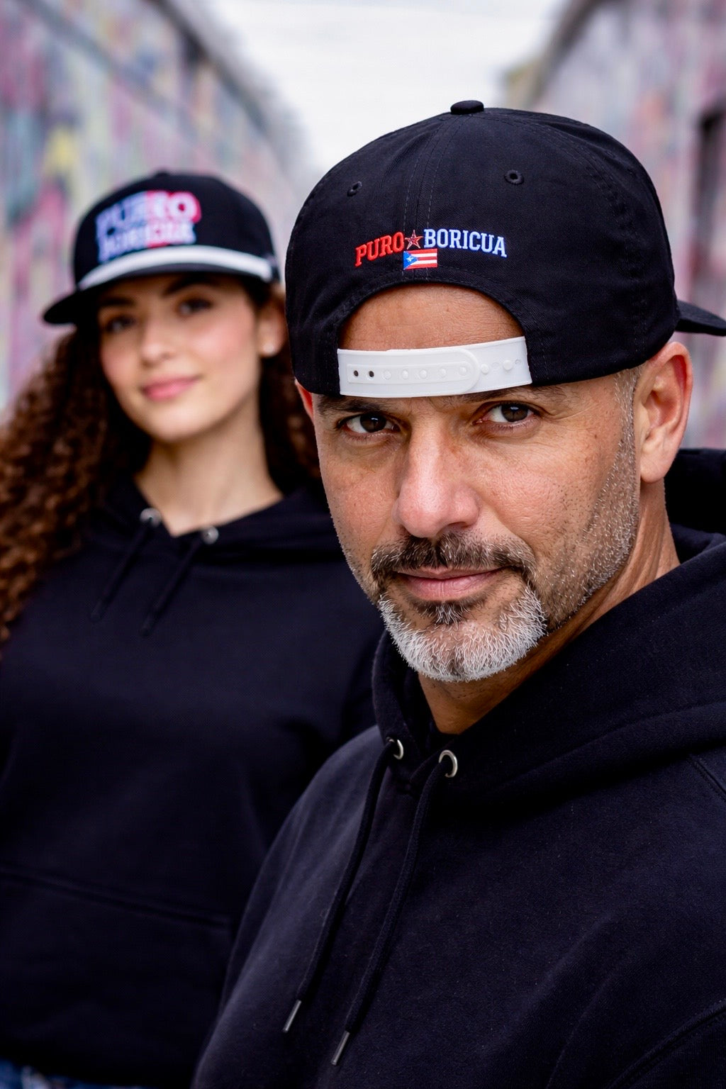 Back view of Pure⭐️Rican PURO BORICUA snapback showing embroidered Puerto Rican flag and adjustable snap closure.