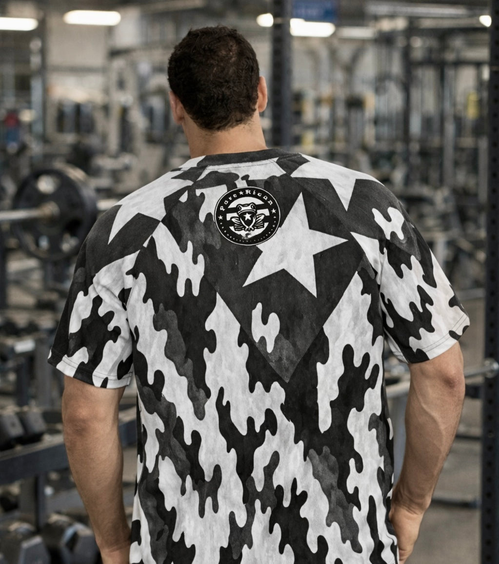 Close-up of Puro⭐️Boricua 24 front graphic on black and white camo Pure⭐️Rican rash guard.