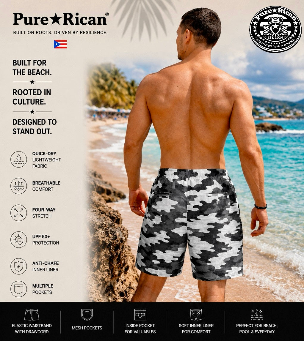 Back view of a male model wearing Pure⭐️Rican Black Camo Star Swim Shorts on a tropical beach, showcasing the rear fit and black-and-white camo pattern. Premium lifestyle product image highlighting lightweight quick-dry swimwear, breathable comfort, UPF 50+ protection, mesh pockets, anti-chafe inner liner, and beach-ready performance under the Pure⭐️Rican brand.