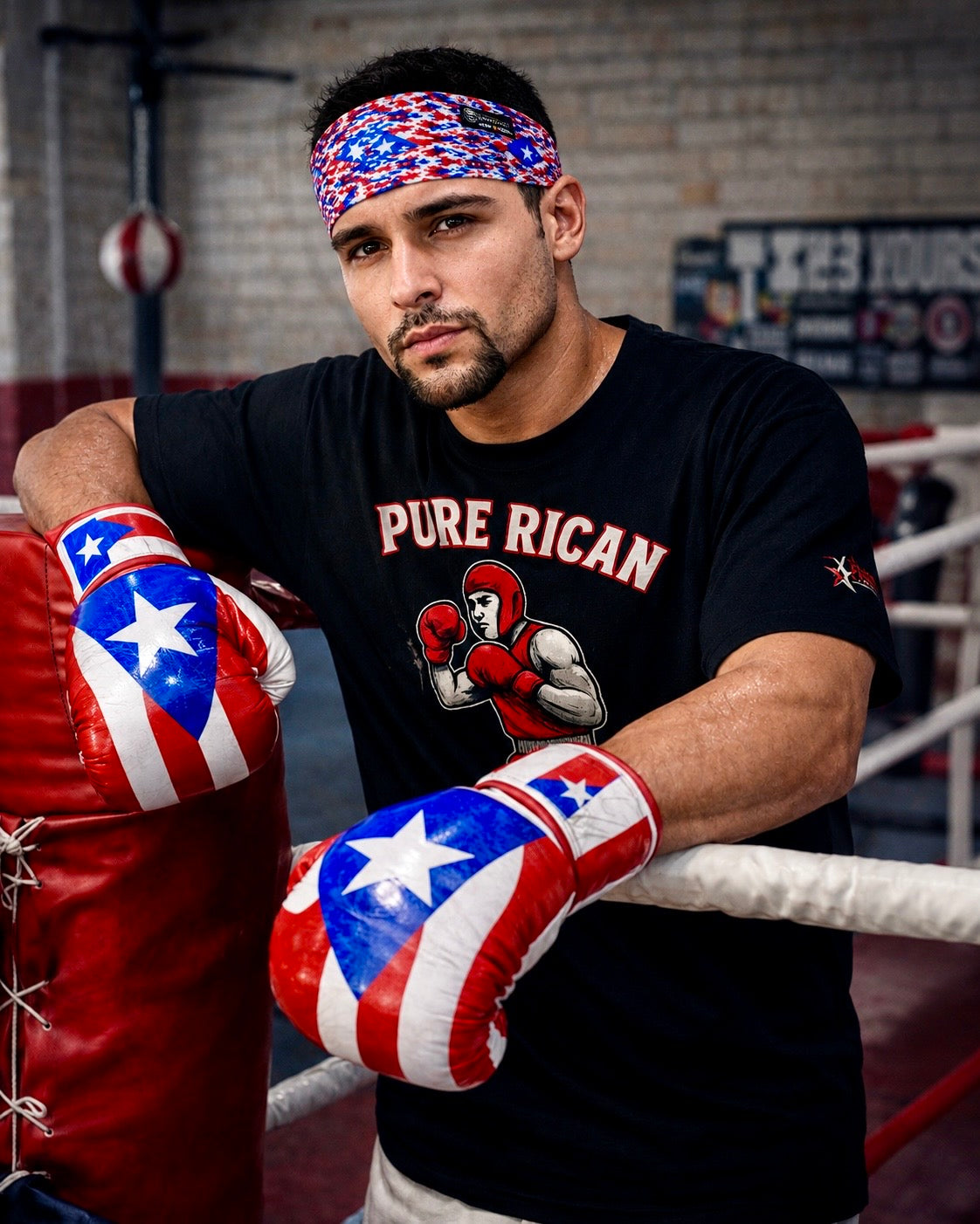 Boxer wearing the Pure⭐️Rican patriotic camo performance headband inside a boxing gym showing athletic and training lifestyle use.
