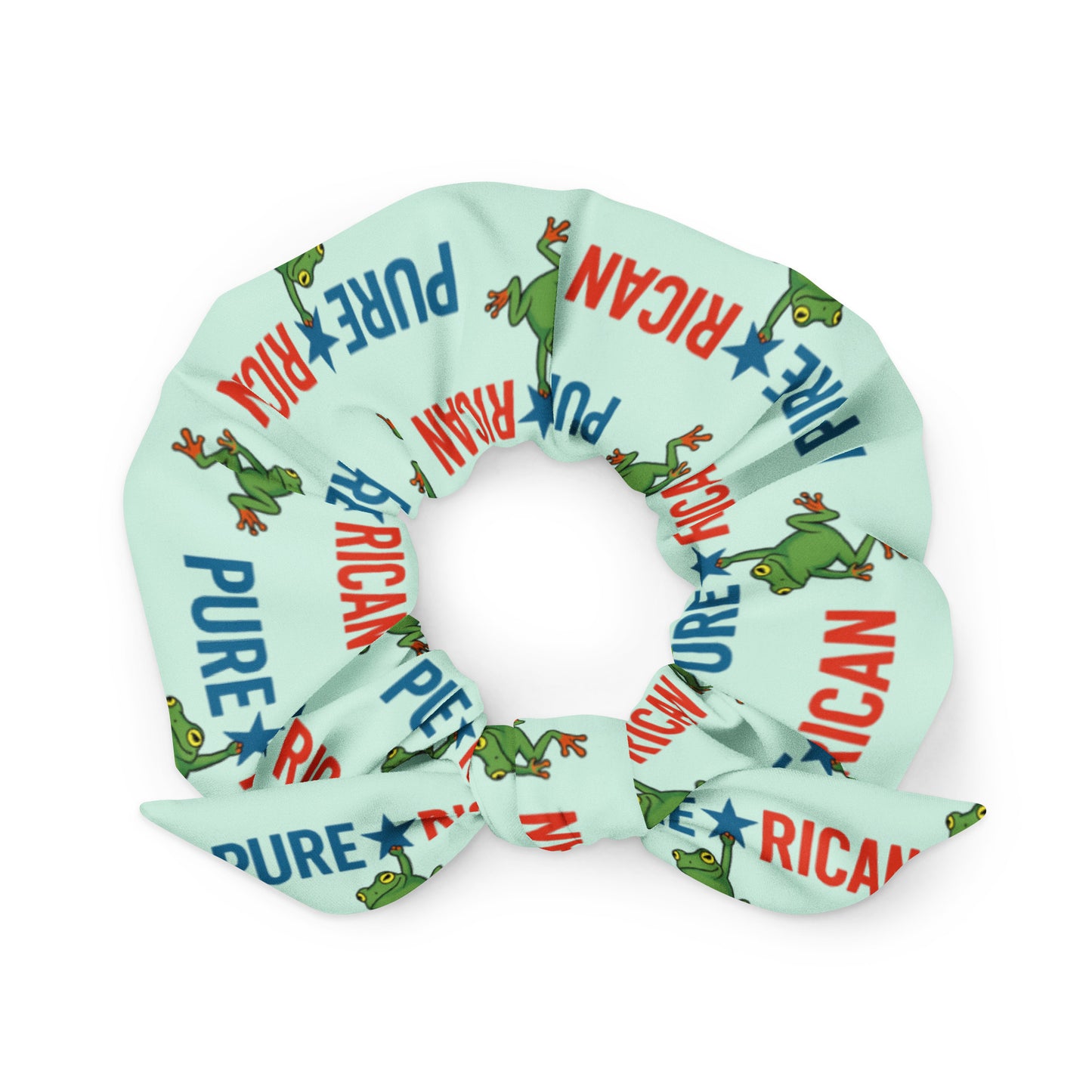 Pure⭐️Rican Sapo Concho scrunchie featuring a repeating logo pattern with the frog mascot hanging from the star in the Pure⭐️Rican name