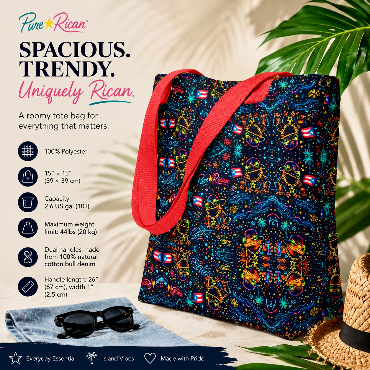 Pure⭐️Rican Sapo Galaxy Midnight tote bag with red cotton handles displayed in a premium tropical setting with island-inspired accents and palm leaves. Spacious Puerto Rican tote bag for shopping, travel, beach days, and everyday use.