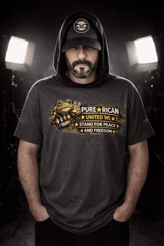 Pure⭐️Rican Stand For Peace graphic t-shirt worn by model featuring Sapo Concho mascot and unity message.