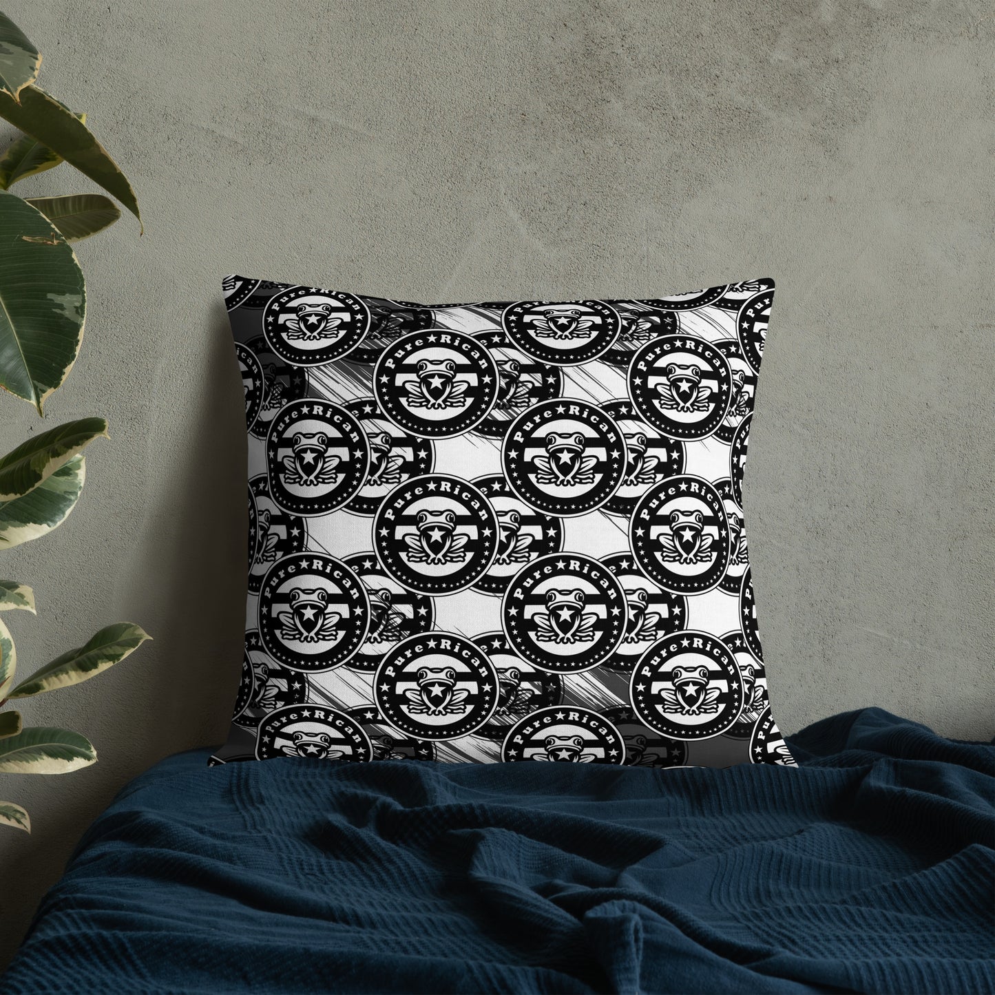 Pure⭐️Rican Sapo Concho black and white throw pillow styled on a modern accent chair in a neutral home setting