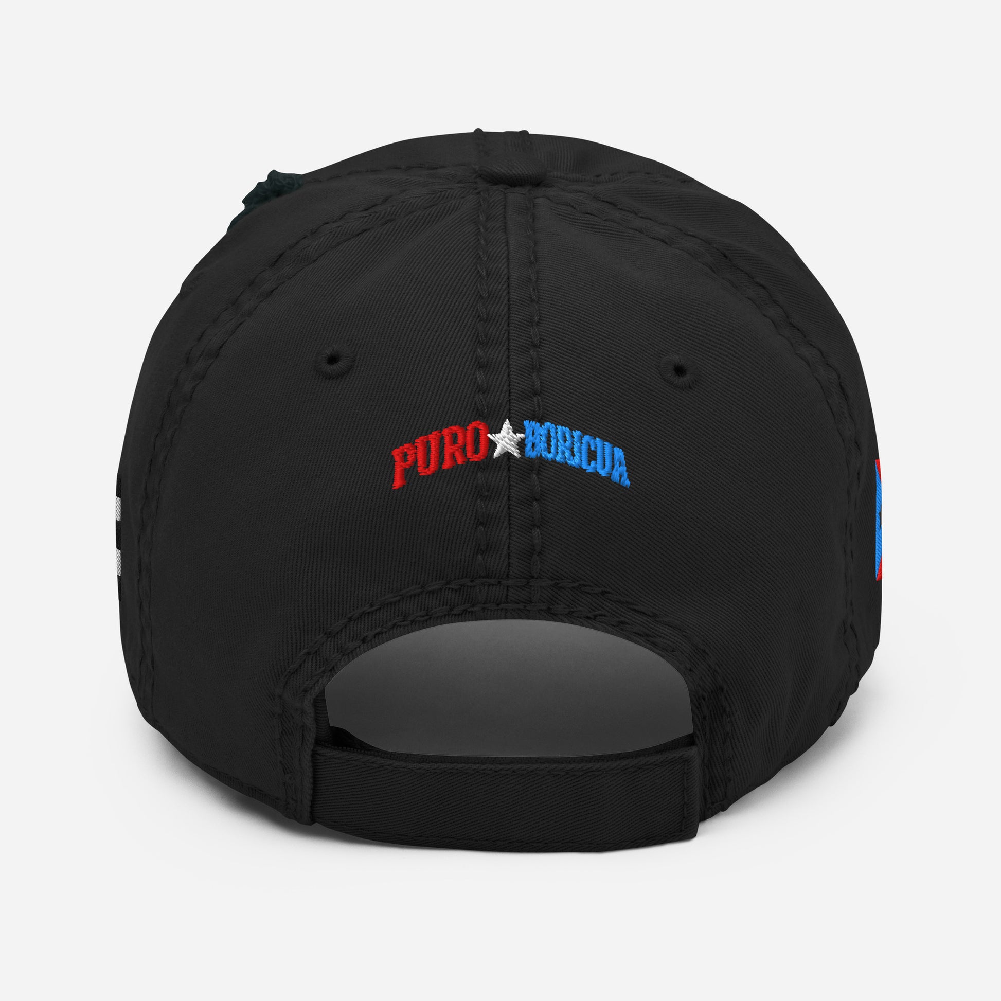 Product moc Black distressed dad hat featuring a circular “Pure★Rican” OG emblem on the front and a Puerto Rican flag patch on the side.