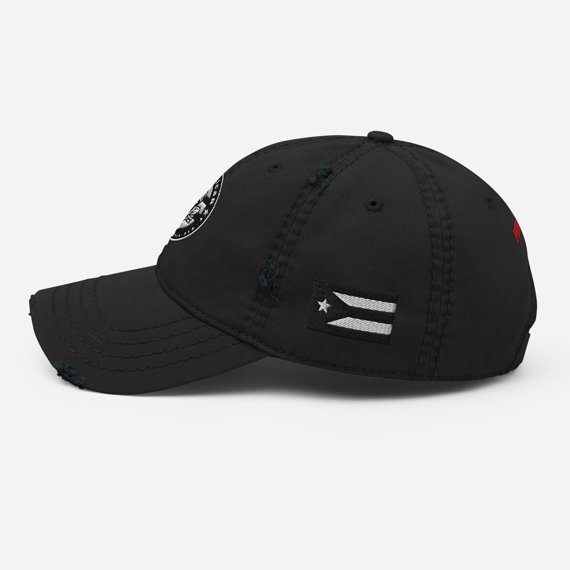 Product moc Black distressed dad hat featuring a circular “Pure★Rican” OG emblem on the front and a Puerto Rican flag patch on the side.
