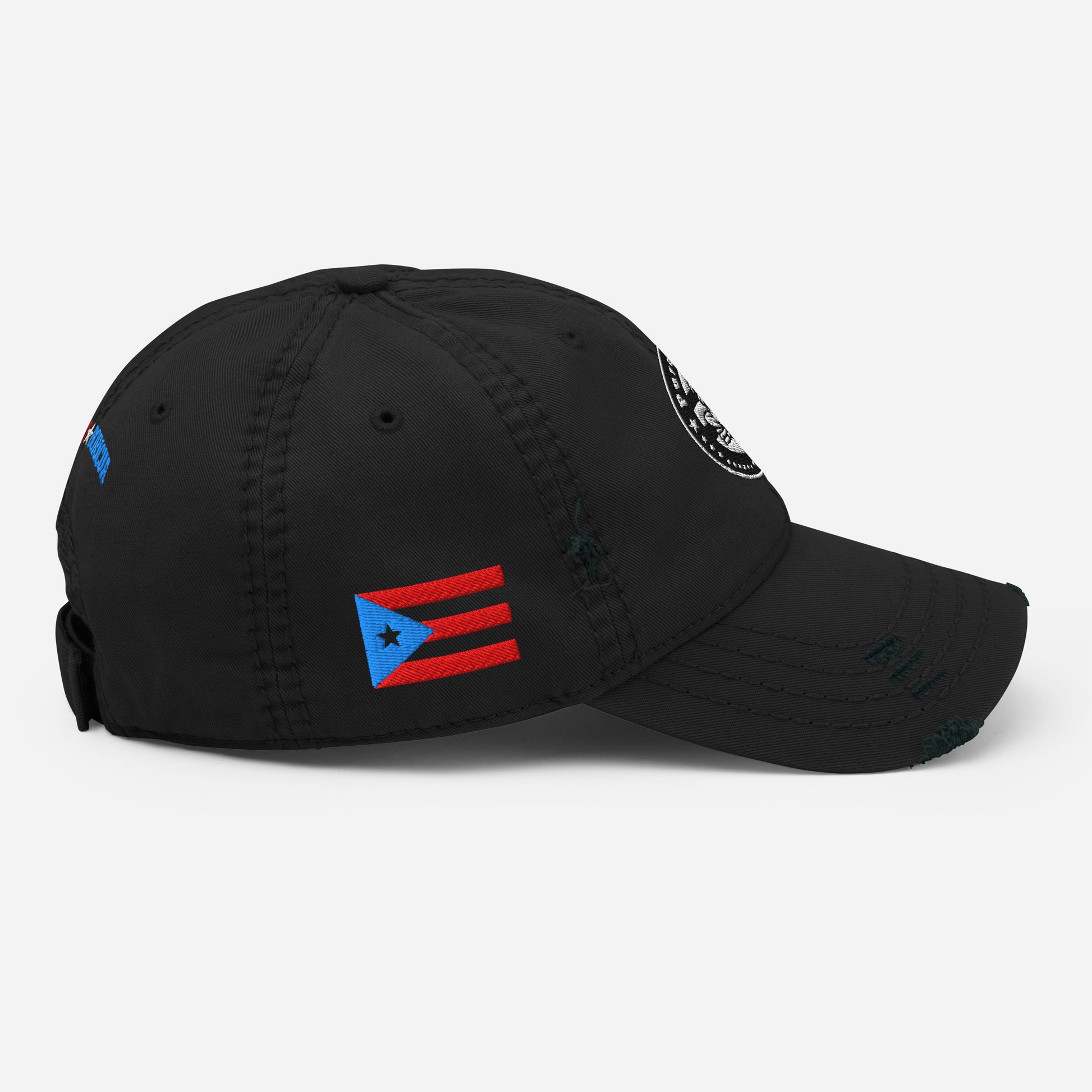 Product moc Black distressed dad hat featuring a circular “Pure★Rican” OG emblem on the front and a Puerto Rican flag patch on the side.